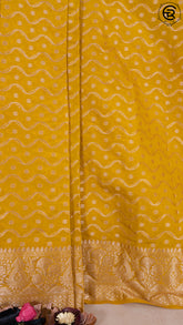 Yellow Zari Curved Line Pattern Warm Silk Saree