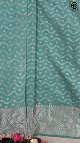 Teal Green Zari Curved Line Pattern Silk Saree