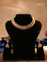 Aalaya Elegant Kundan Choker Necklace Set with Ruby, Emerald & Pearl Accents