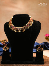 Aalaya Kundan Choker Necklace Set with Pearl Drops & Ruby Highlights