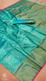 Aqua Blue Intricate Geometric Floral Jacquard Kanchi Soft Silk Saree