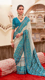White and Blue Ikkat Patola Crepe Banarasi Saree