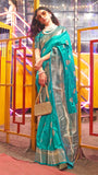 Turquoise Green Patterned Zari Weaved Banarasi Silk Saree