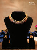 Aalaya Elegant Kundan Choker Necklace Set with Ruby, Emerald & Pearl Accents