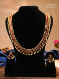 Aalaya Long Kundan Necklace Set with Pearl Fringe & Ruby Detailing