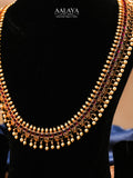 Aalaya Long Kundan Necklace Set with Pearl Fringe & Ruby Detailing
