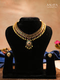 Aalaya Kundan Choker Necklace Set with Emerald Accents & Teardrop Pendant
