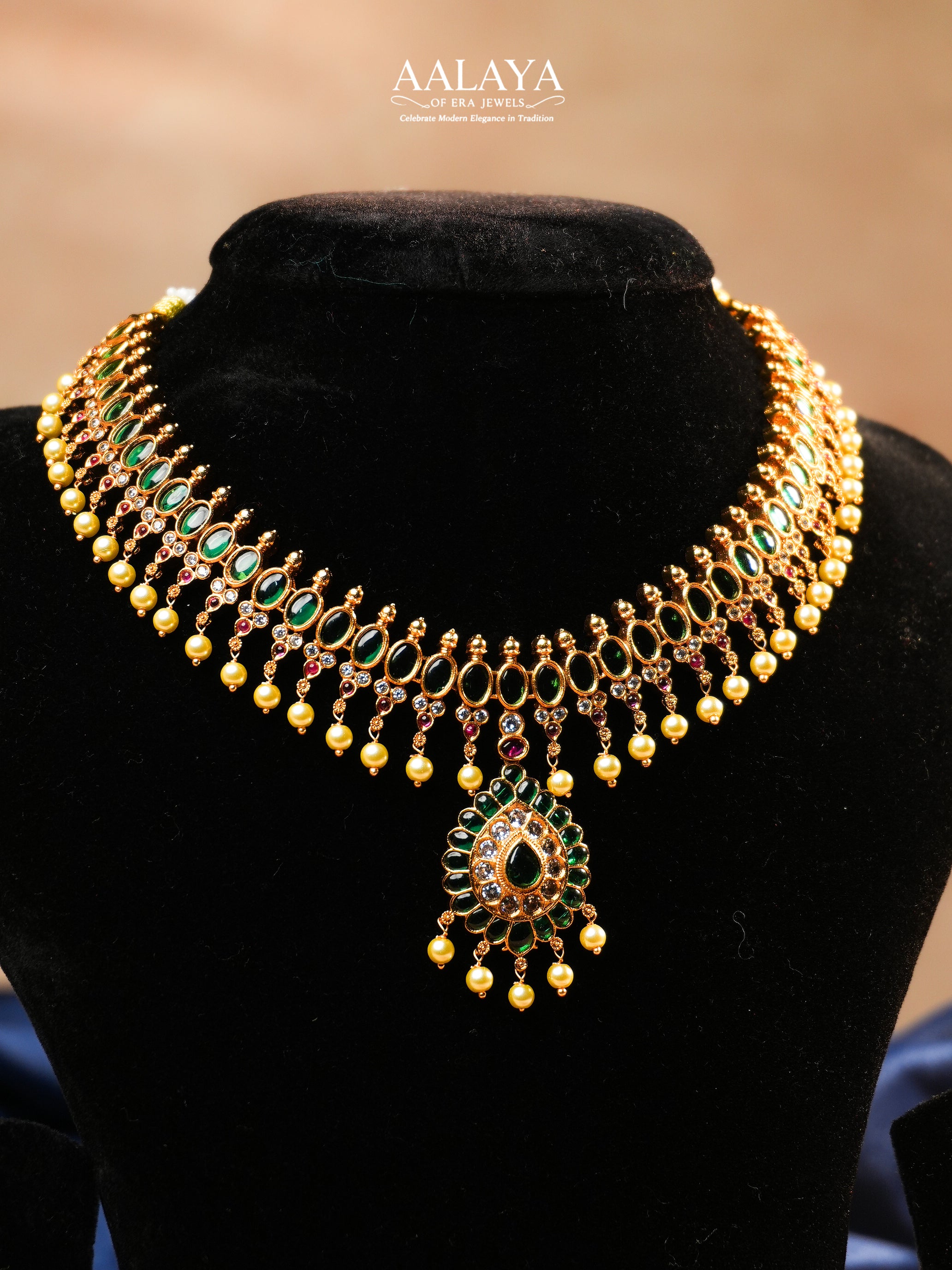 Aalaya Kundan Choker Necklace Set with Emerald Accents & Teardrop Pendant