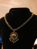 Aalaya Minimal Kundan Necklace Set with Emerald Pendant & Delicate Drops