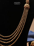 Aalaya Lakshmi Multi-Layer Beaded Haram Set with Temple Jhumkas
