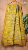 White & Black Checkered Yellow Floral Handblocked Pure Maheshwari Cotton Saree
